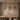 Lunette pendant above a dining table